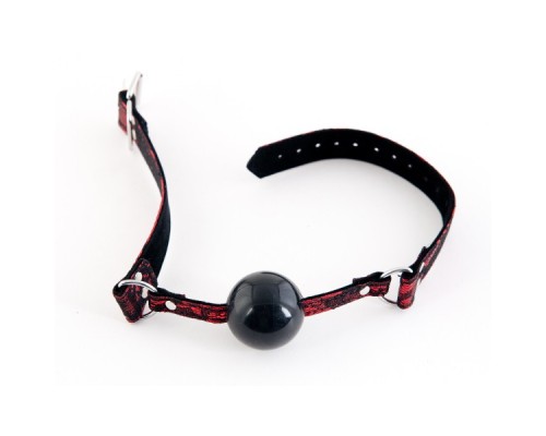 Кляп силиконовый на кружевном ремешке TOYFA Marcus красный, 78 см