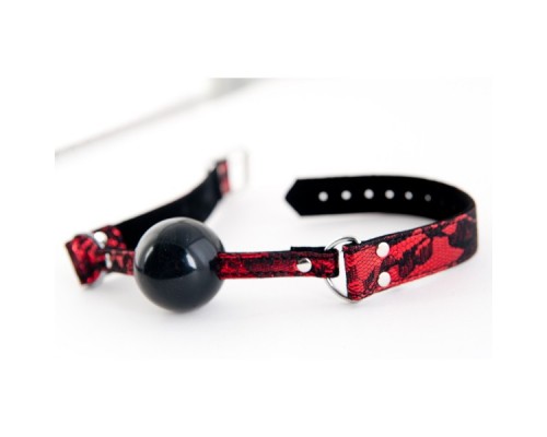 Кляп силиконовый на кружевном ремешке TOYFA Marcus красный, 78 см