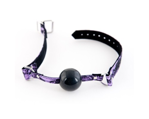 Кляп силиконовый на кружевном ремешке TOYFA Marcus пурпурный, 62 см.