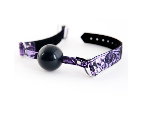Кляп силиконовый на кружевном ремешке TOYFA Marcus пурпурный, 62 см.